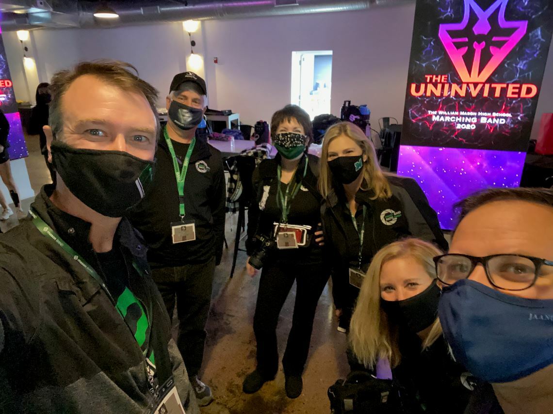 group wearing masks at convention